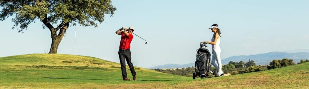 golfer caddie playing golf